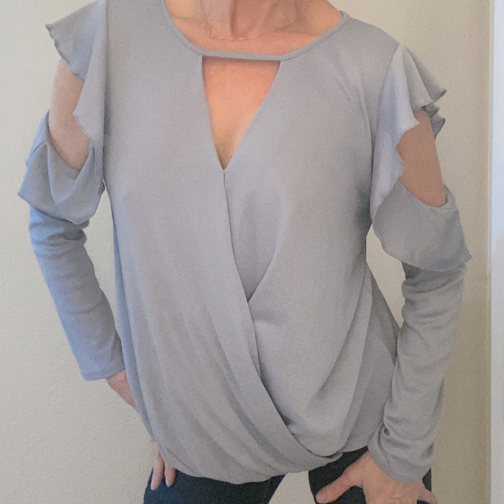 Cut out long sleeve steel blue top.